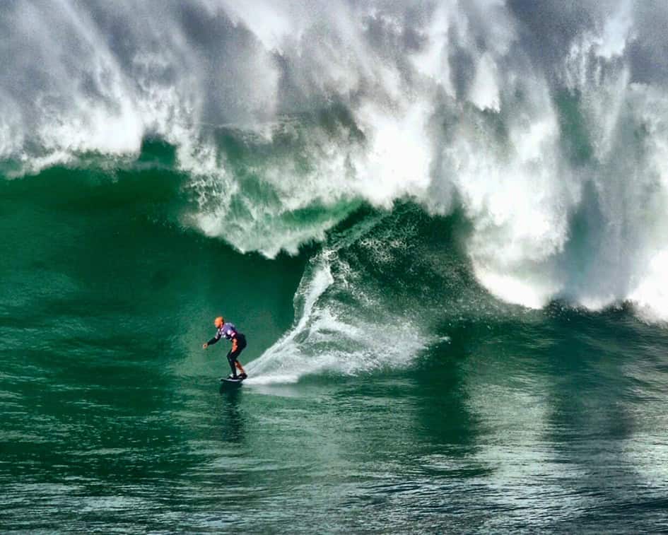Surfer on a Green Sea